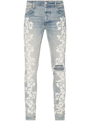 AMIRI Hibiscus floral-print skinny jeans