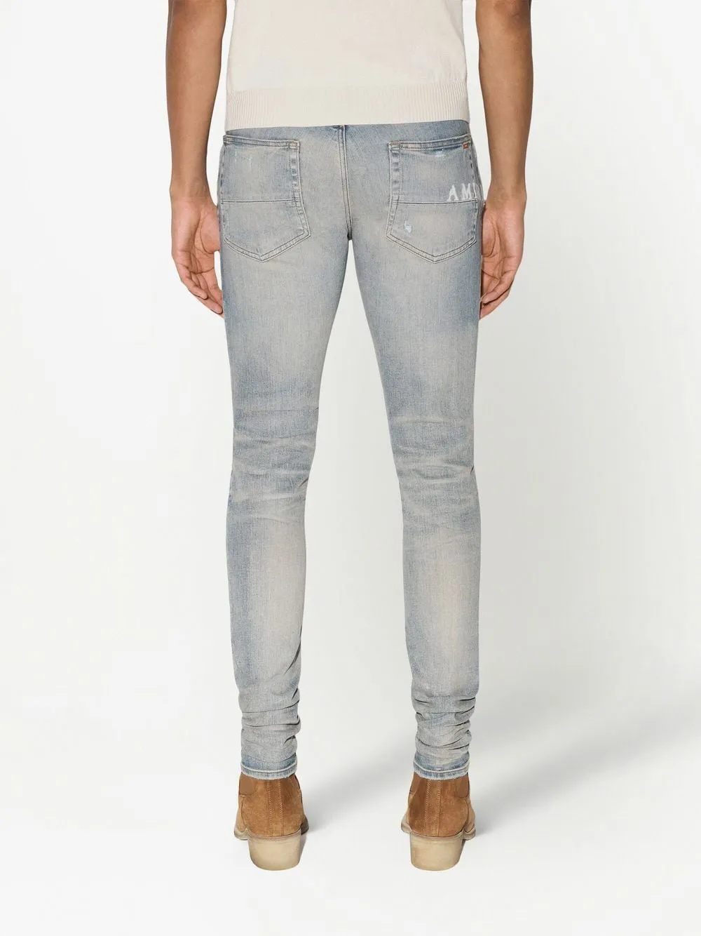 AMIRI Hibiscus floral-print skinny jeans