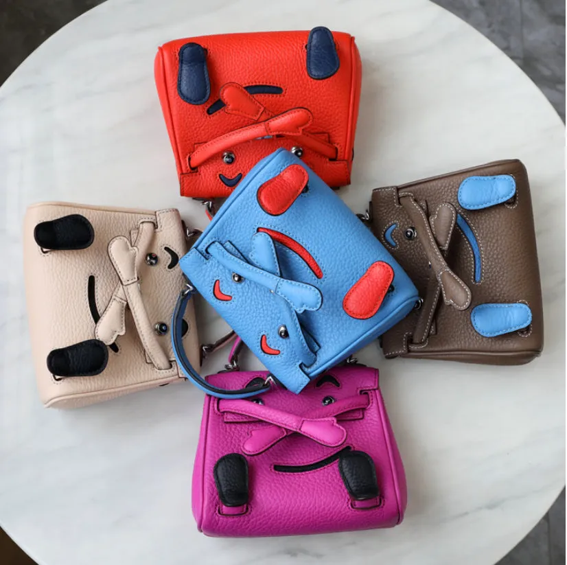 handbag with a monster cartoon bag