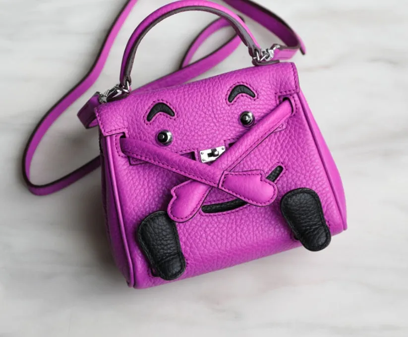 handbag with a monster cartoon bag