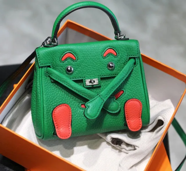 handbag with a monster cartoon bag