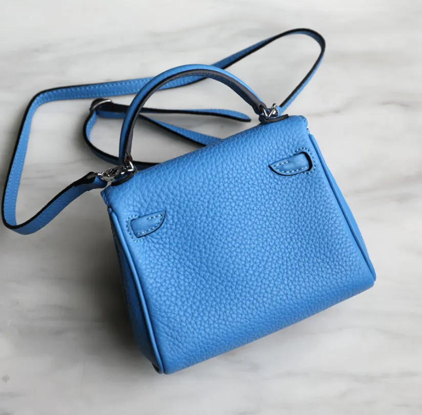 handbag with a monster cartoon bag