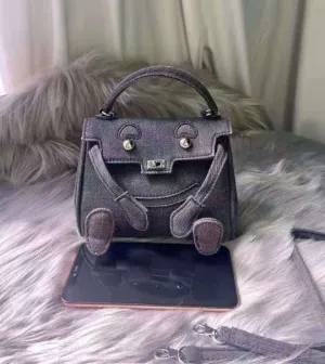 handbag with a monster cartoon bag