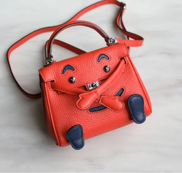 handbag with a monster cartoon bag