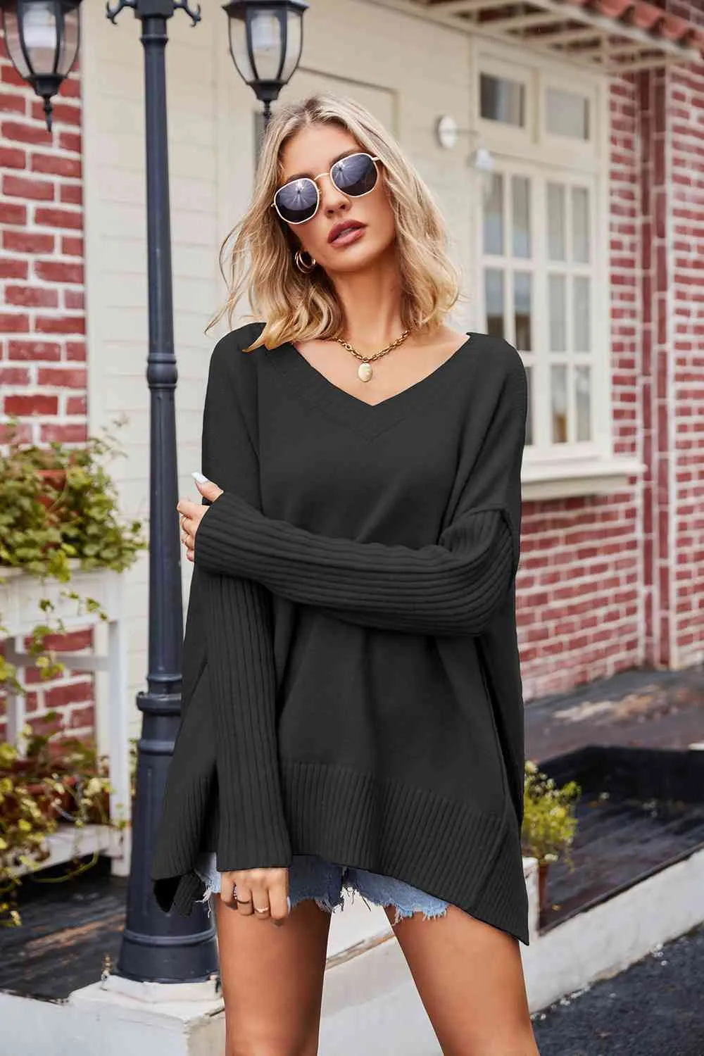 Tess V-Neck Slit Exposed Seam Sweater