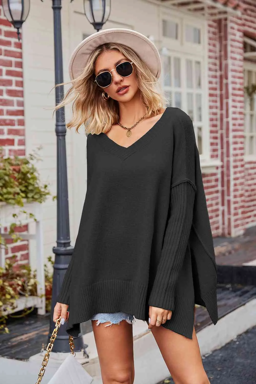 Tess V-Neck Slit Exposed Seam Sweater