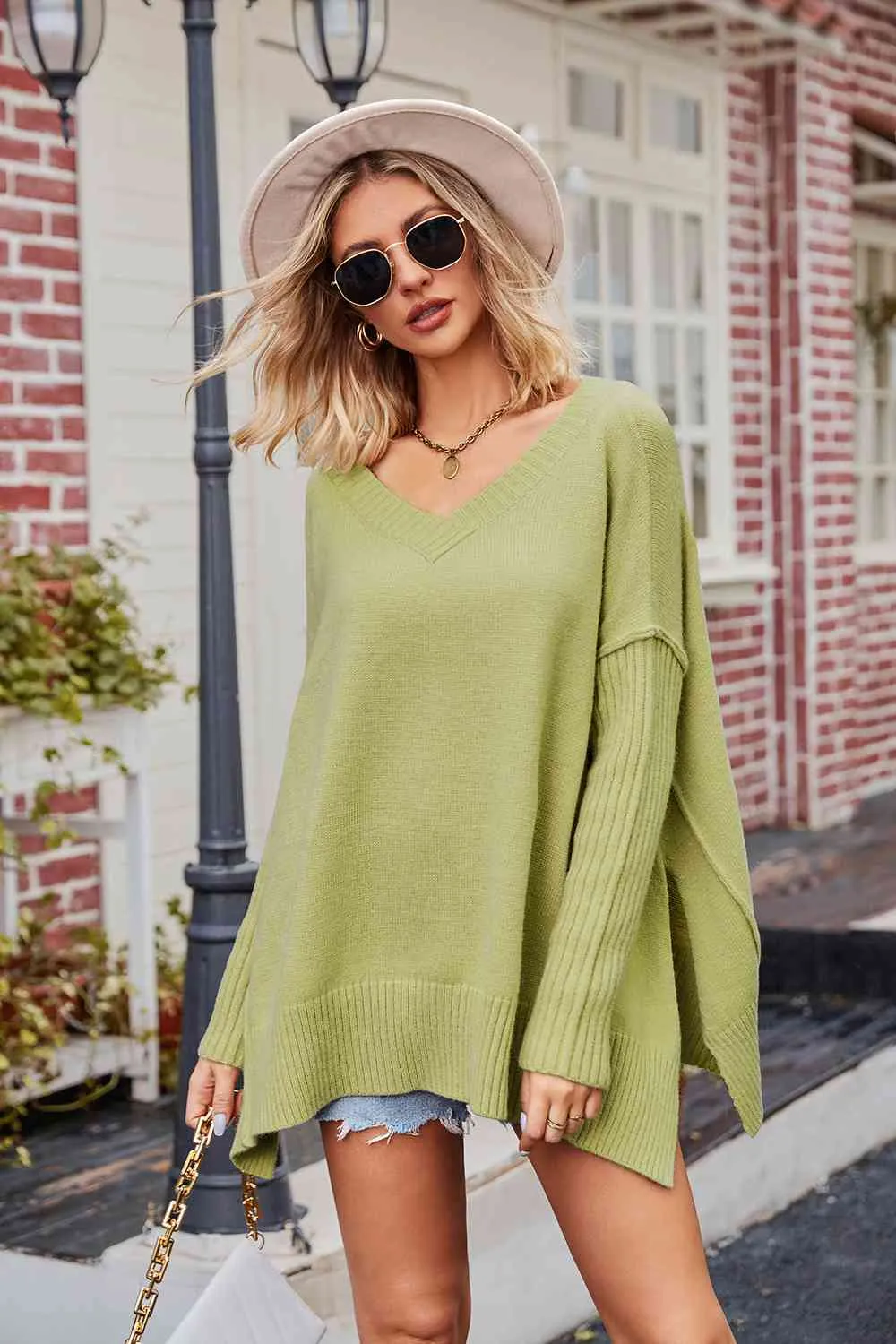 Tess V-Neck Slit Exposed Seam Sweater